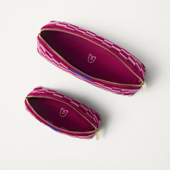 The Vanity Set in ReVelvet™ Orchid shown from the top with zipper closure open.