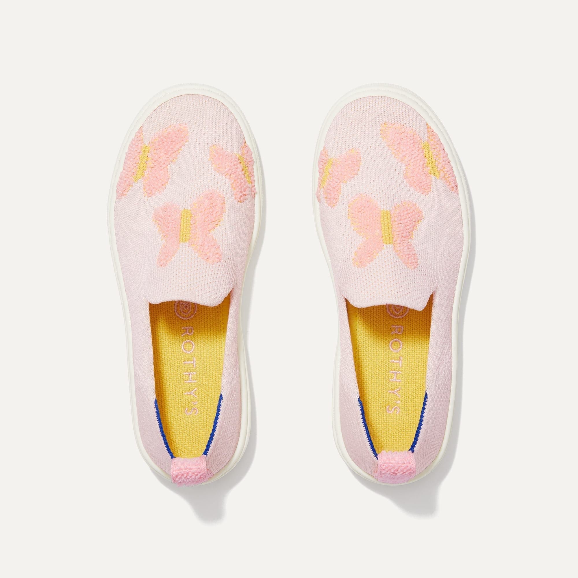 A pair of The Kids slip-on Sneakers in Flutter Pink shown from the top view.