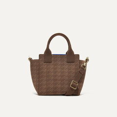 PLP |The Mini Handbag in Cocoa Houndstooth shown from the front.