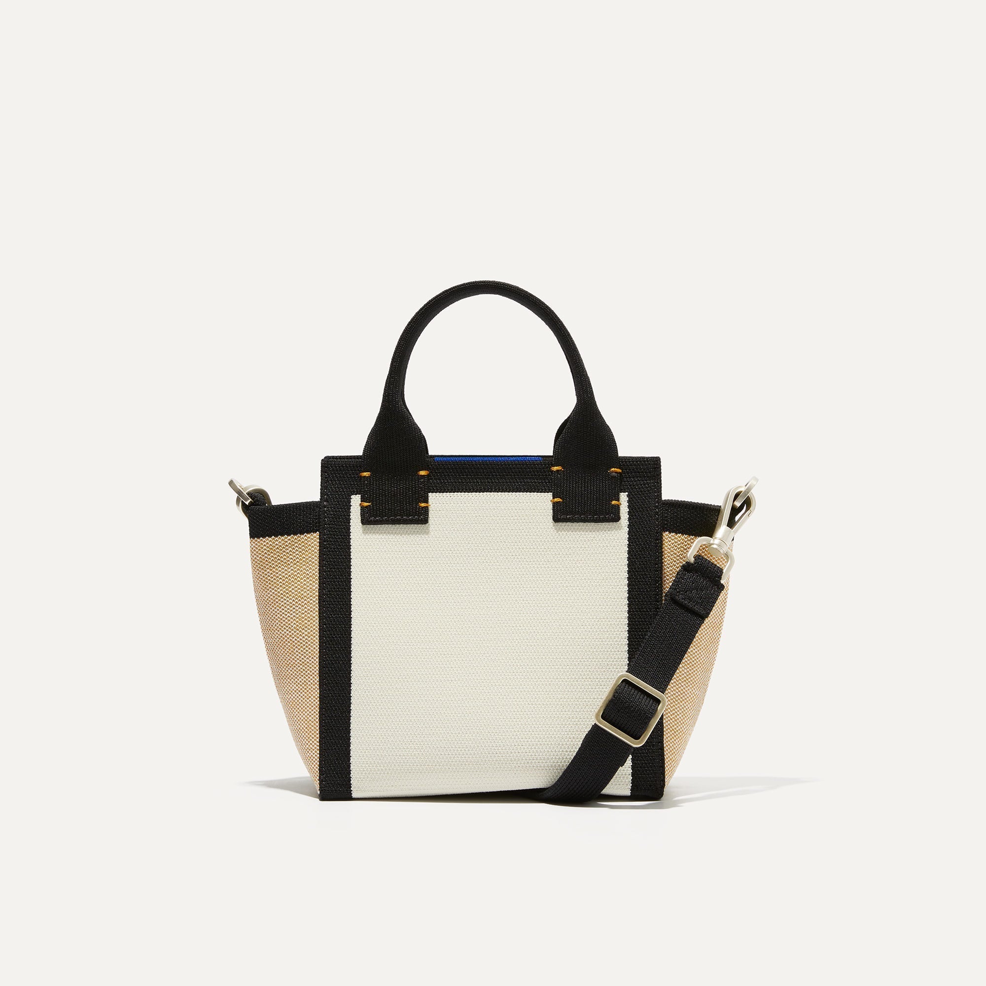PLP |The Mini Handbag in Piano Keys shown from the front.
