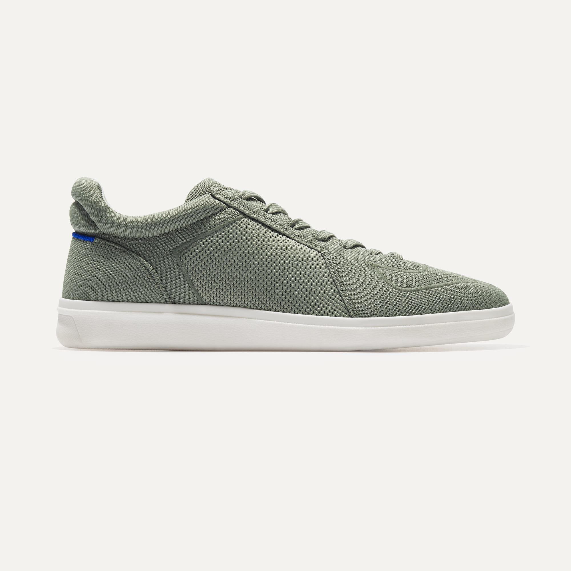 The RS01 Sneaker in Olive shown from the side. 