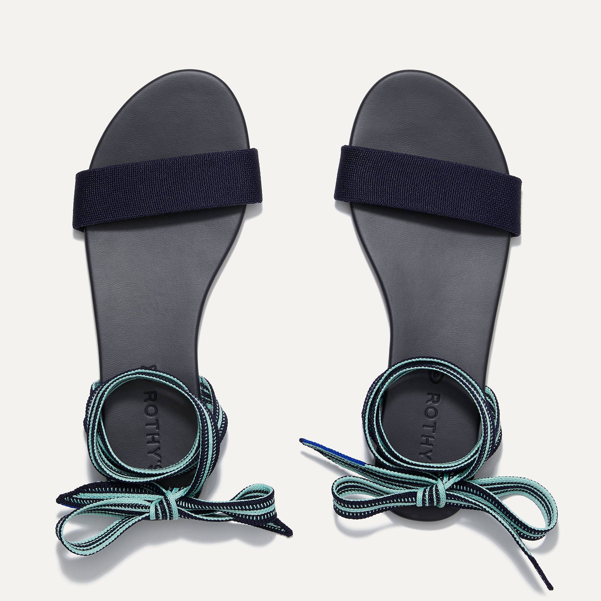 A pair of The Wrap slide sandals in Surf shown from the top view.
