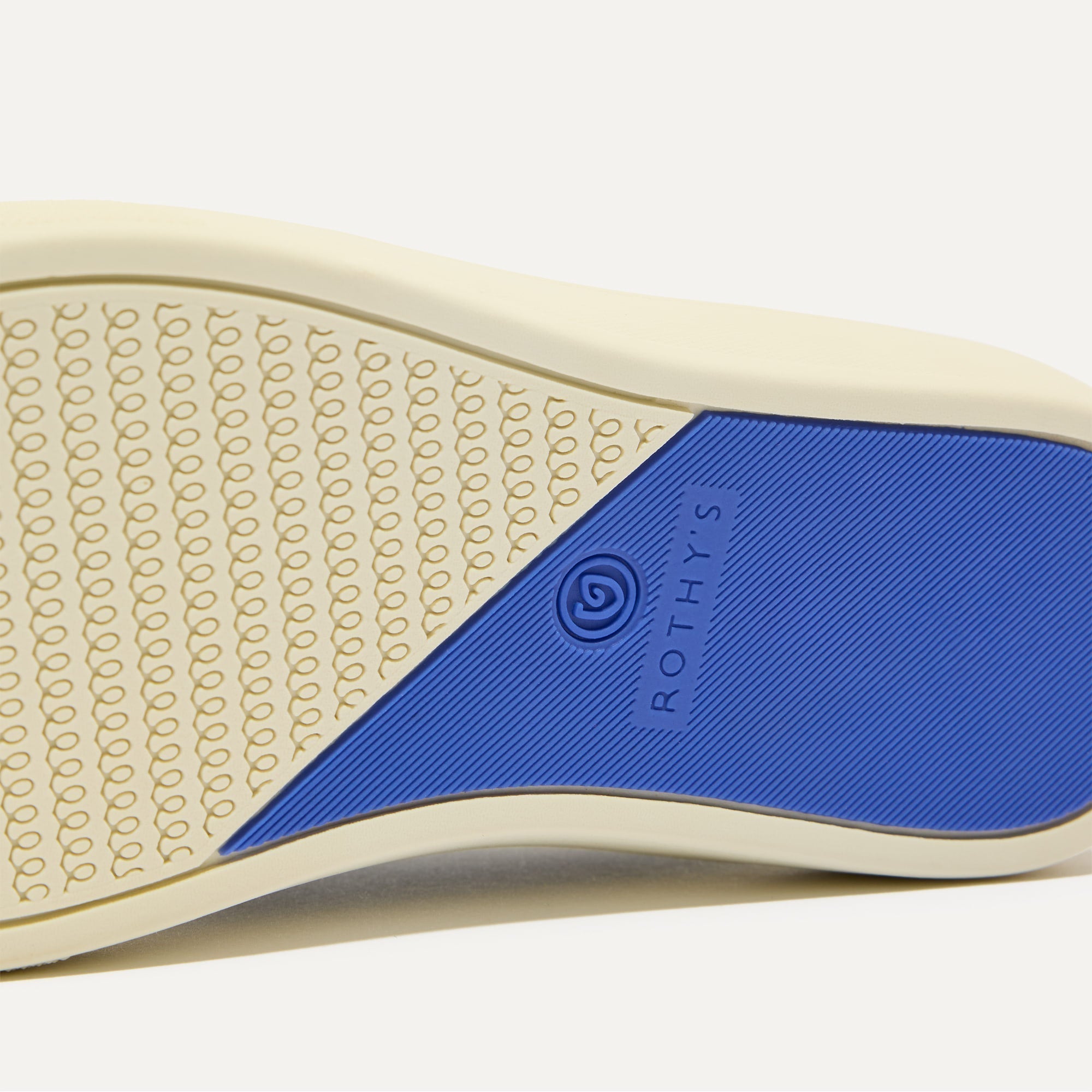 The sole of The Kids Strap Sneaker in Spruce Camo.