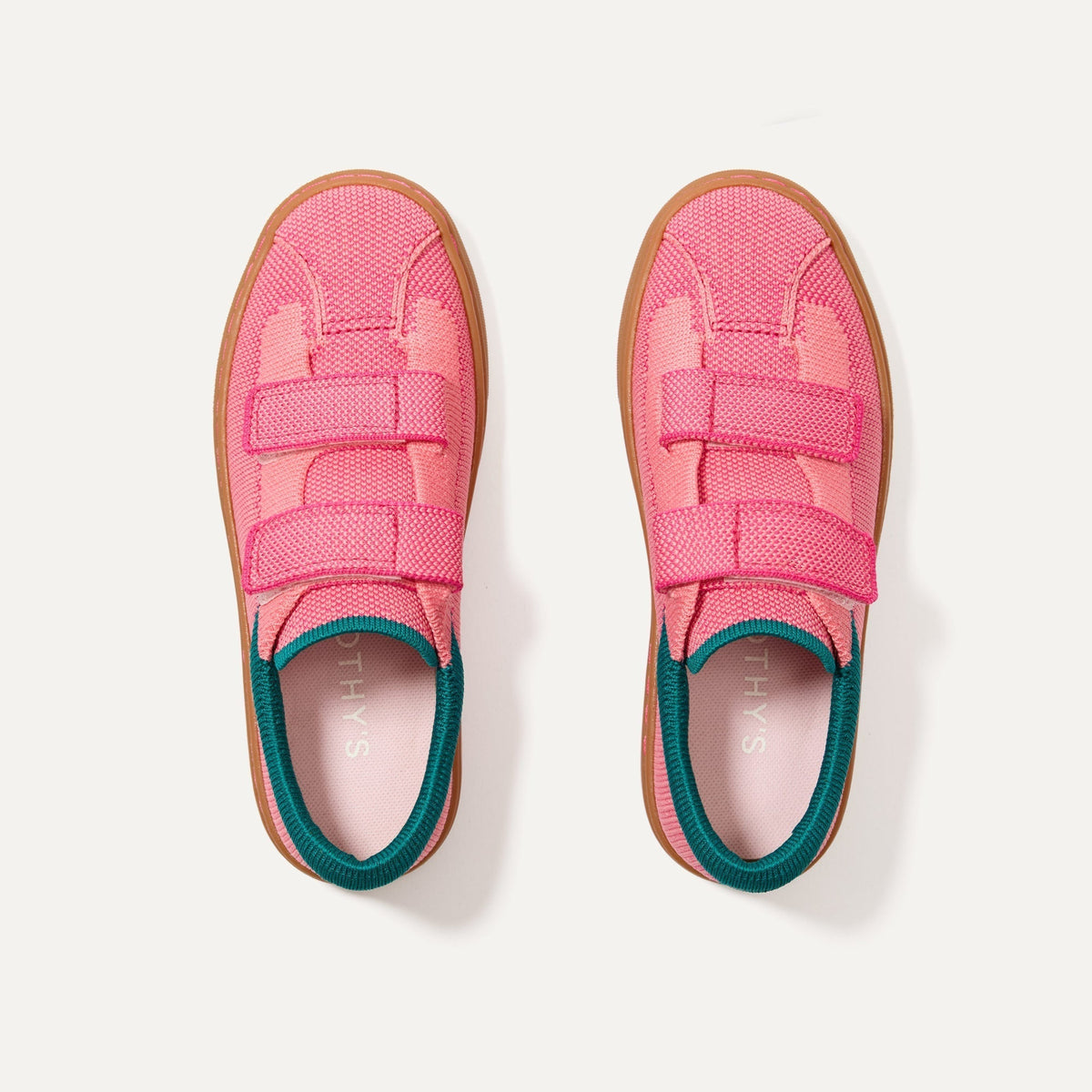 The Kids Strap Sneaker in Watermelon shown from the top. 
