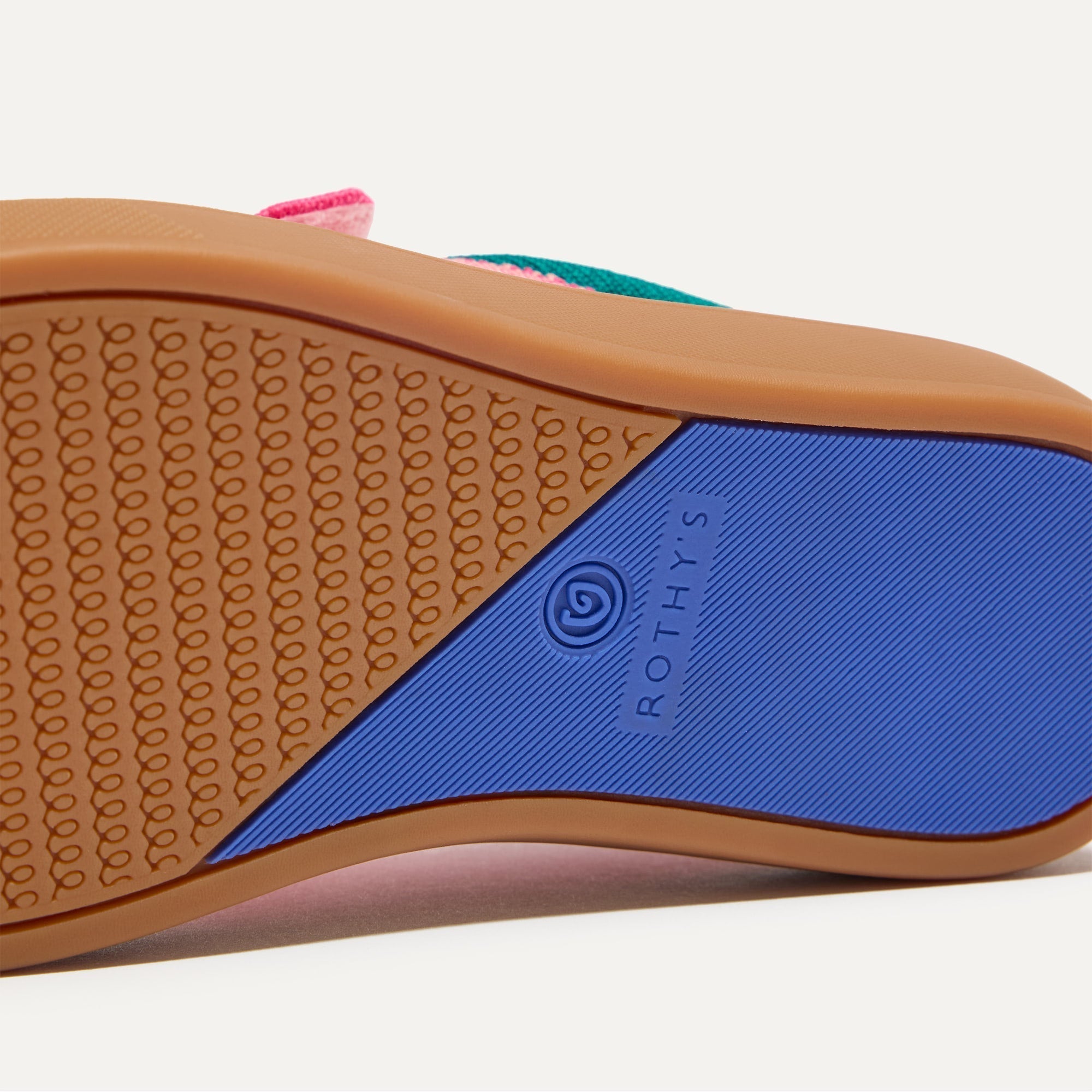 The sole of The Kids Strap Sneaker in Watermelon.