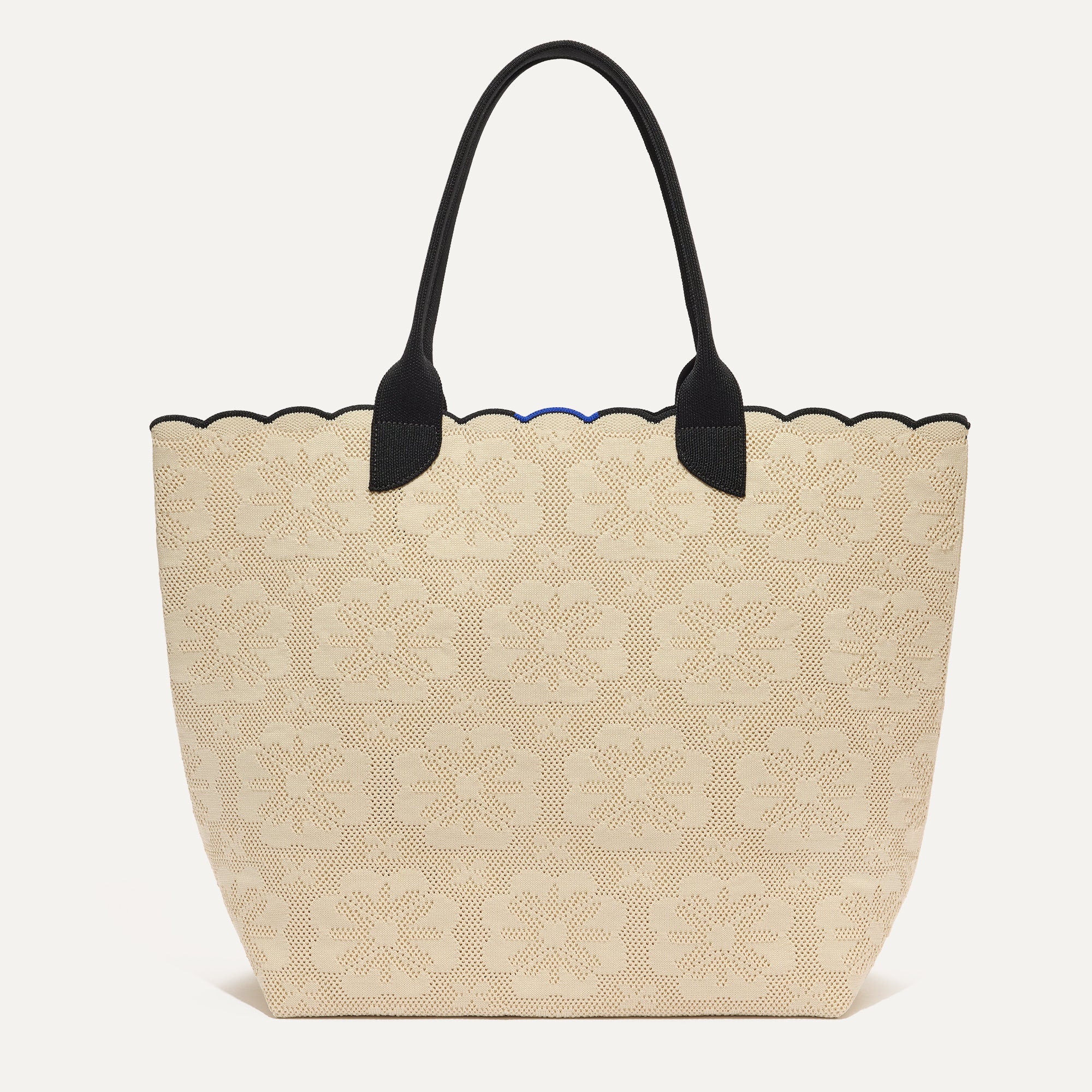PLP |The Lightweight Tote in Ivory Carnation shown from the front. 