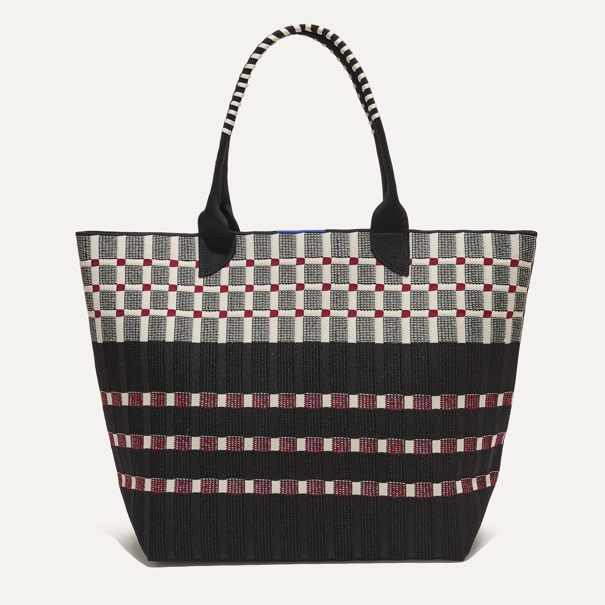PLP |The Lightweight Tote in Newspaper shown from the front. 