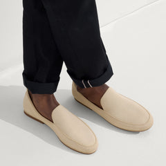 hover | Model wearing The Ravello Loafer in Sand. 