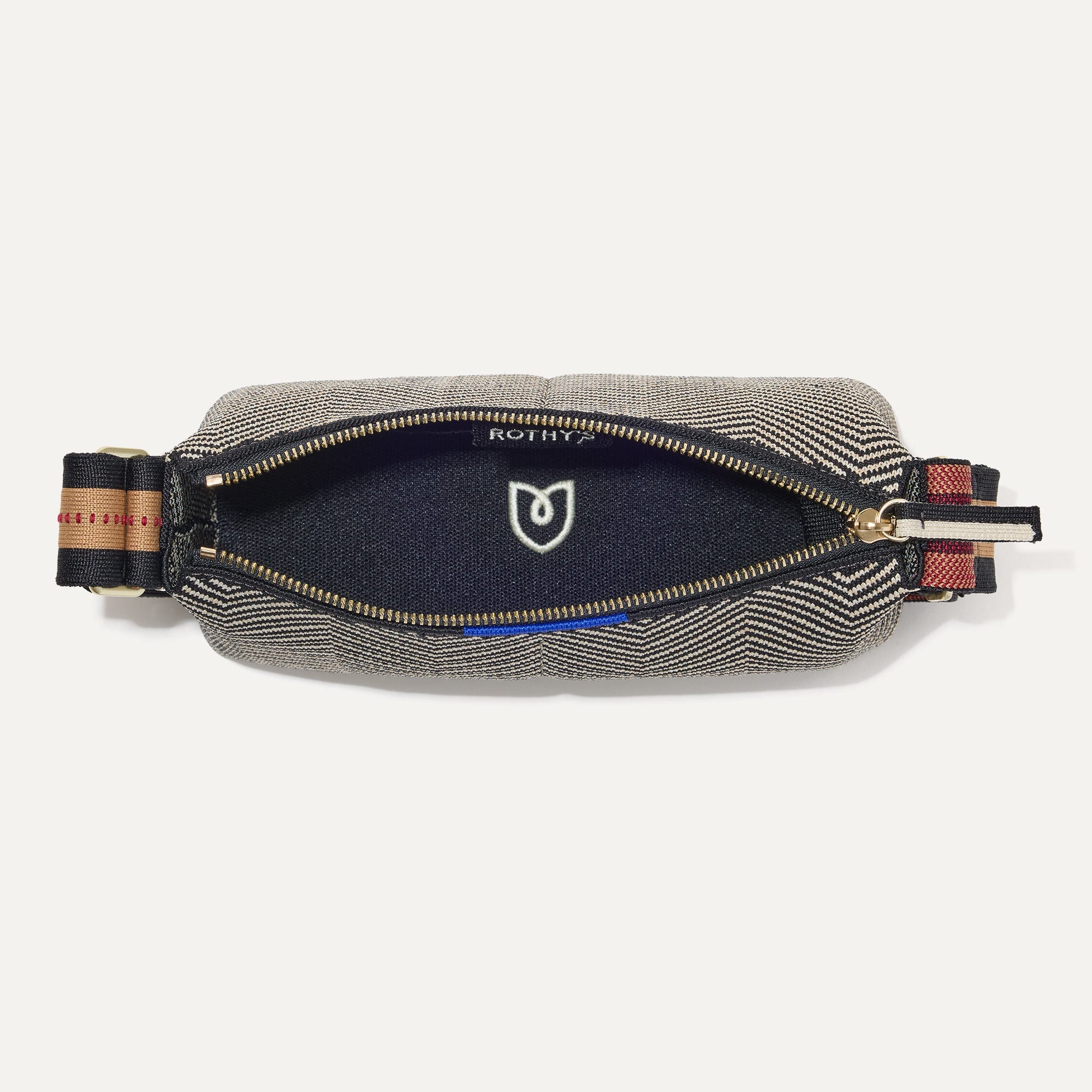 The Casual Crossbody in Dark Mist, shown from above, with the interior exposed. 