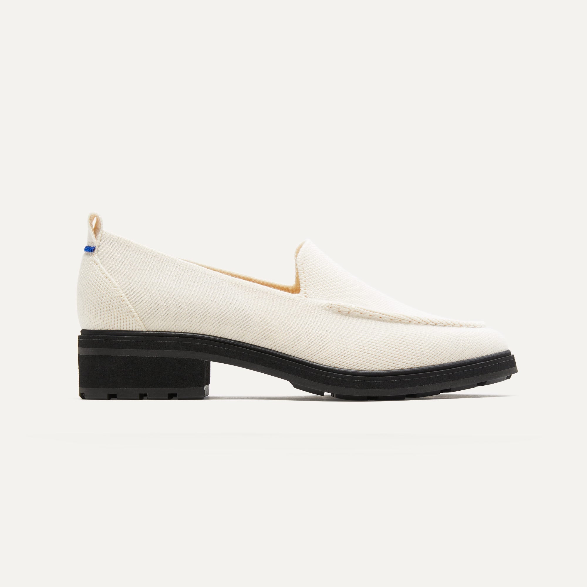 The Lug Loafer in Ivory shown from the side. 