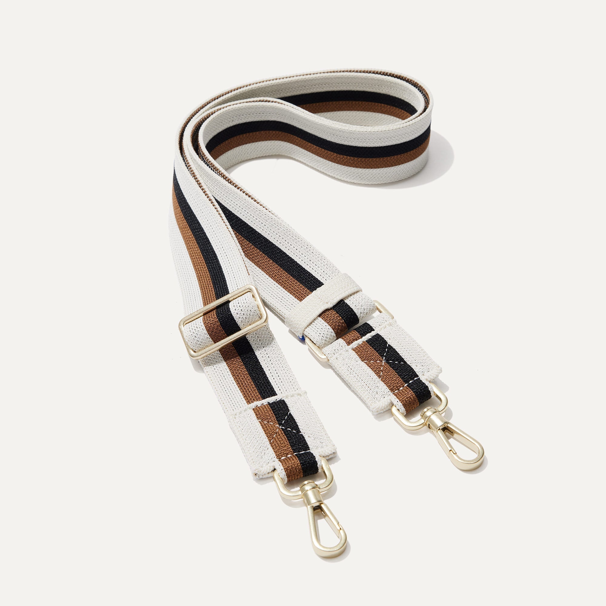 The Crossbody Strap in White Portobello Stripe.