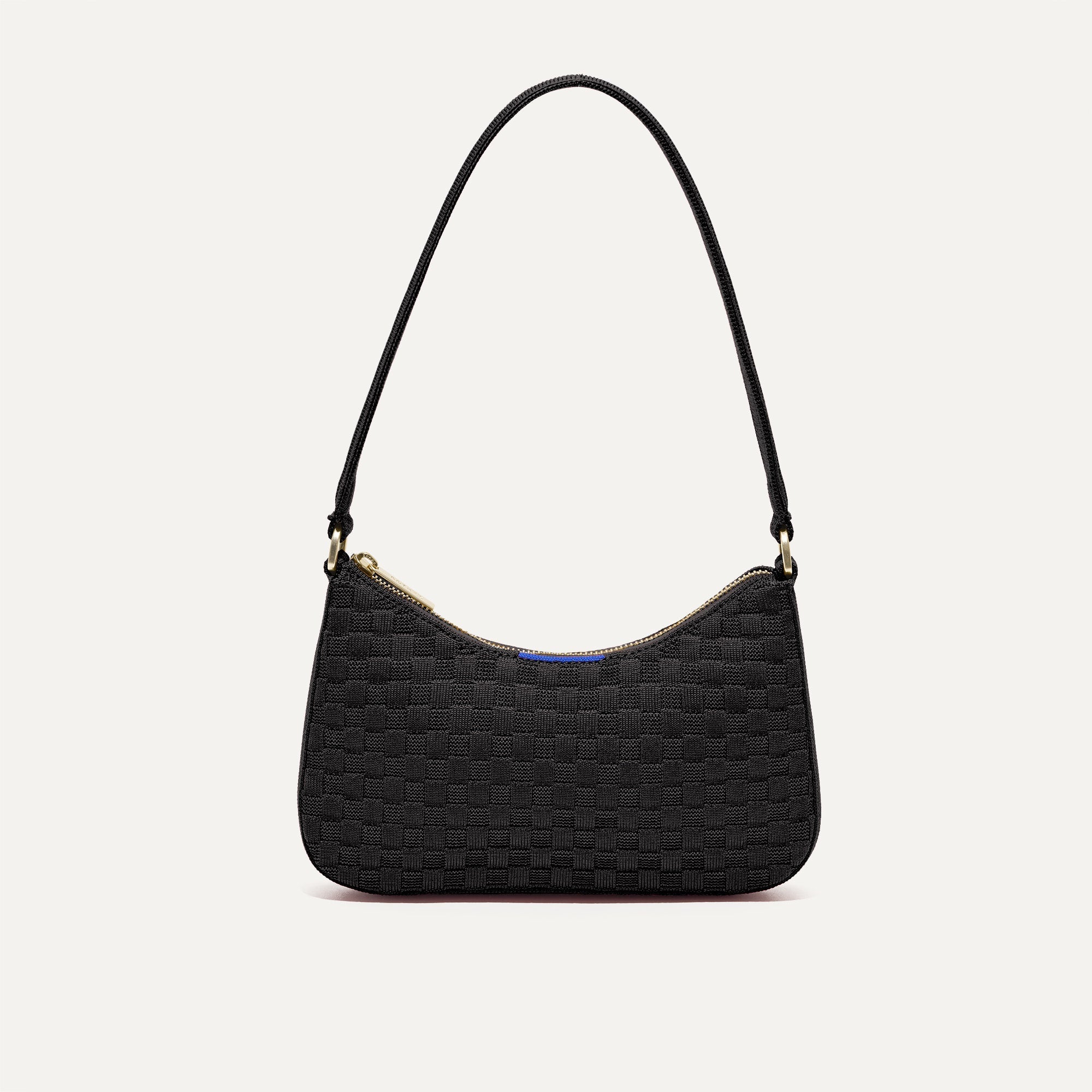 PLP |The Mini Shoulder Bag in Black Sand shown from the front.