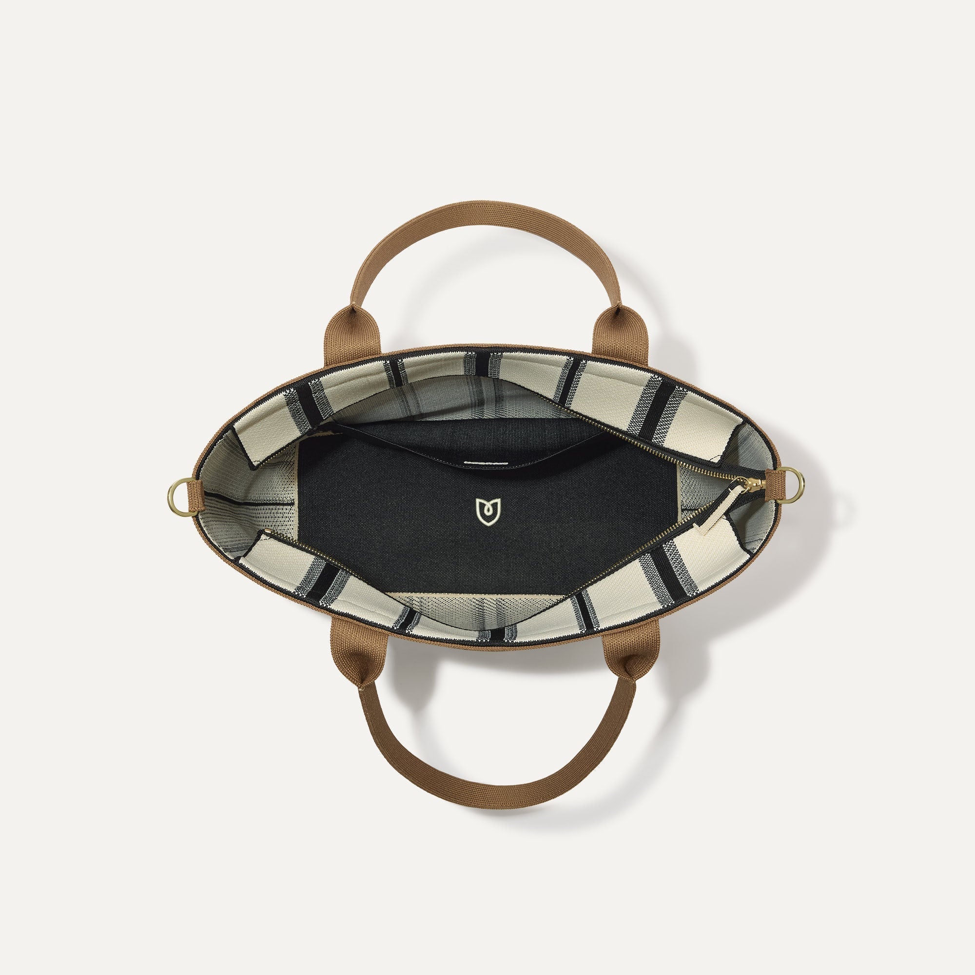 The Lightweight Zip Tote in Coastline, shown from above with the interior exposed.