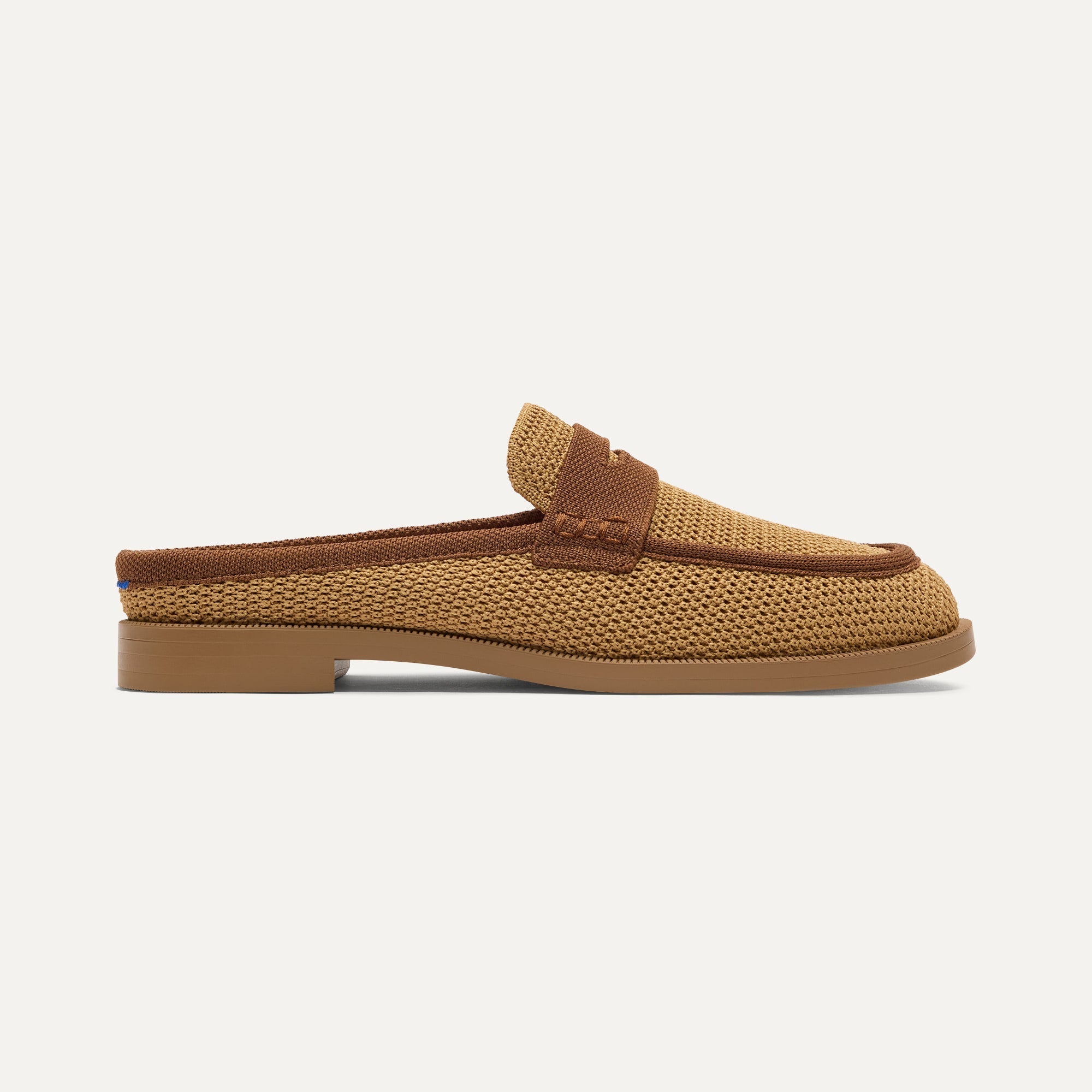side | The Penny Loafer Mule in Wheat Raffia-Knit shown from the side.