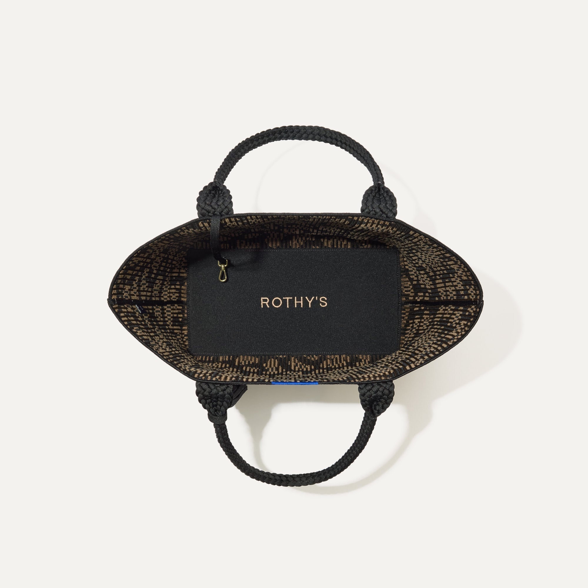 The ReVelvet™ Lightweight Tote in ReVelvet™ Cat shown open from the top, with interior visible. 
