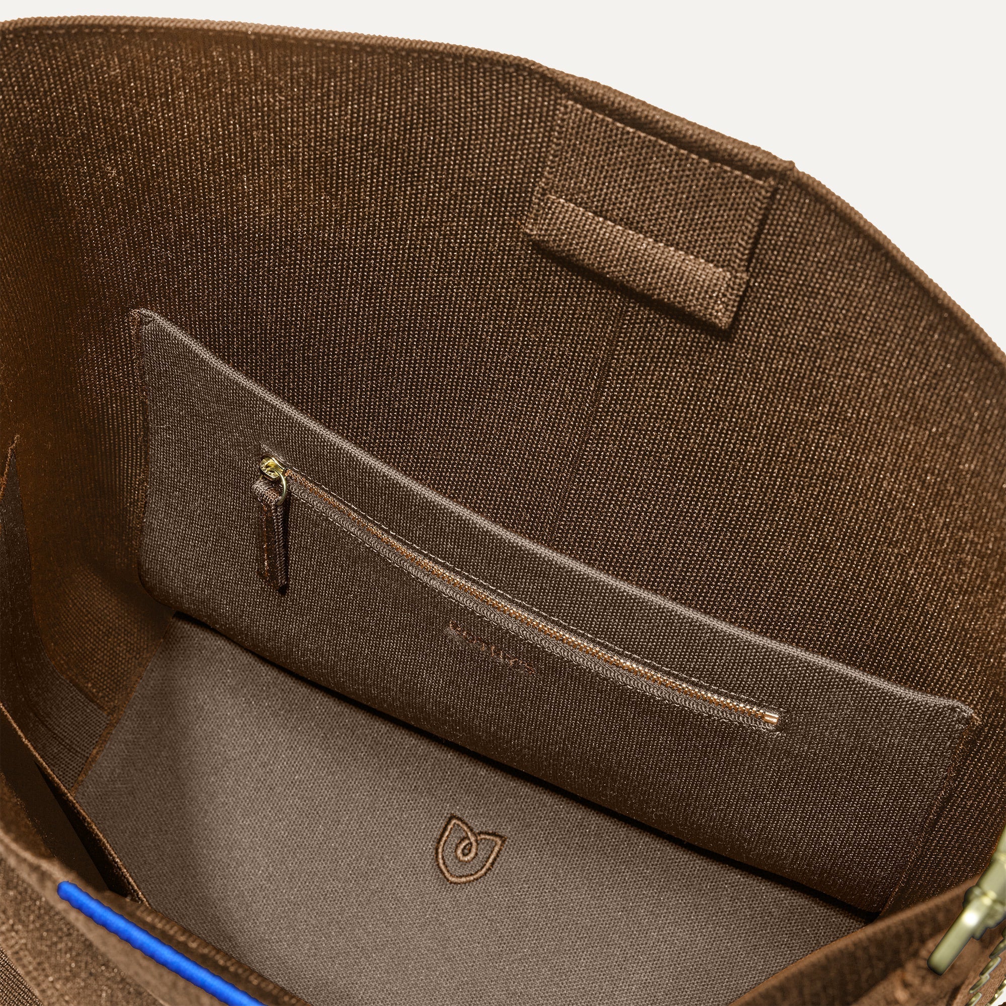 The Bucket Bag in ReVelvet™ close up of interior zipper pocket.