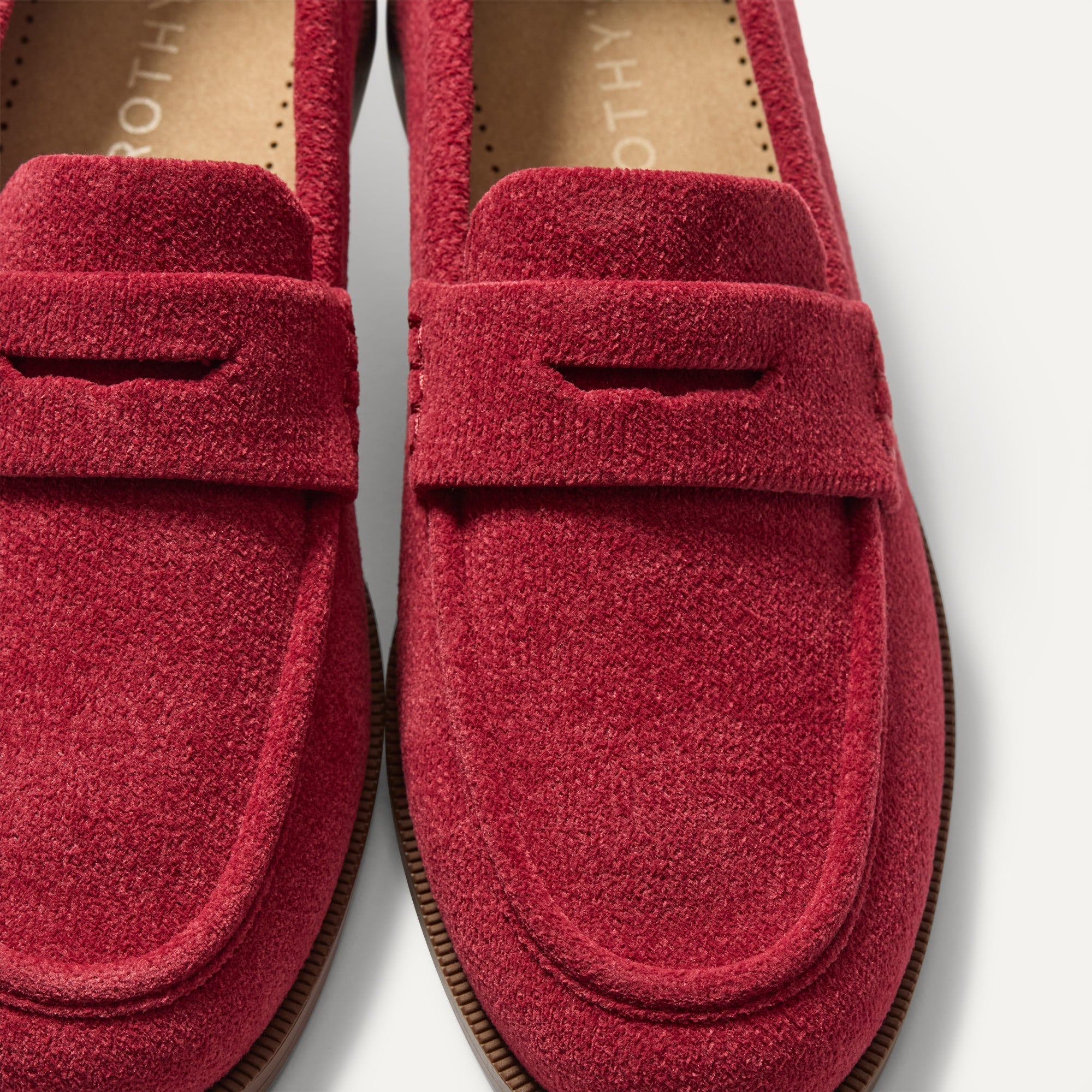 macro | Close up of the toe box and penny keeper of The Penny Loafer in ReVelvet Ruby.