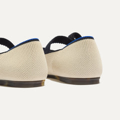 Close up of the heel of The Kids Tux Bow Mary Jane in Ivory.