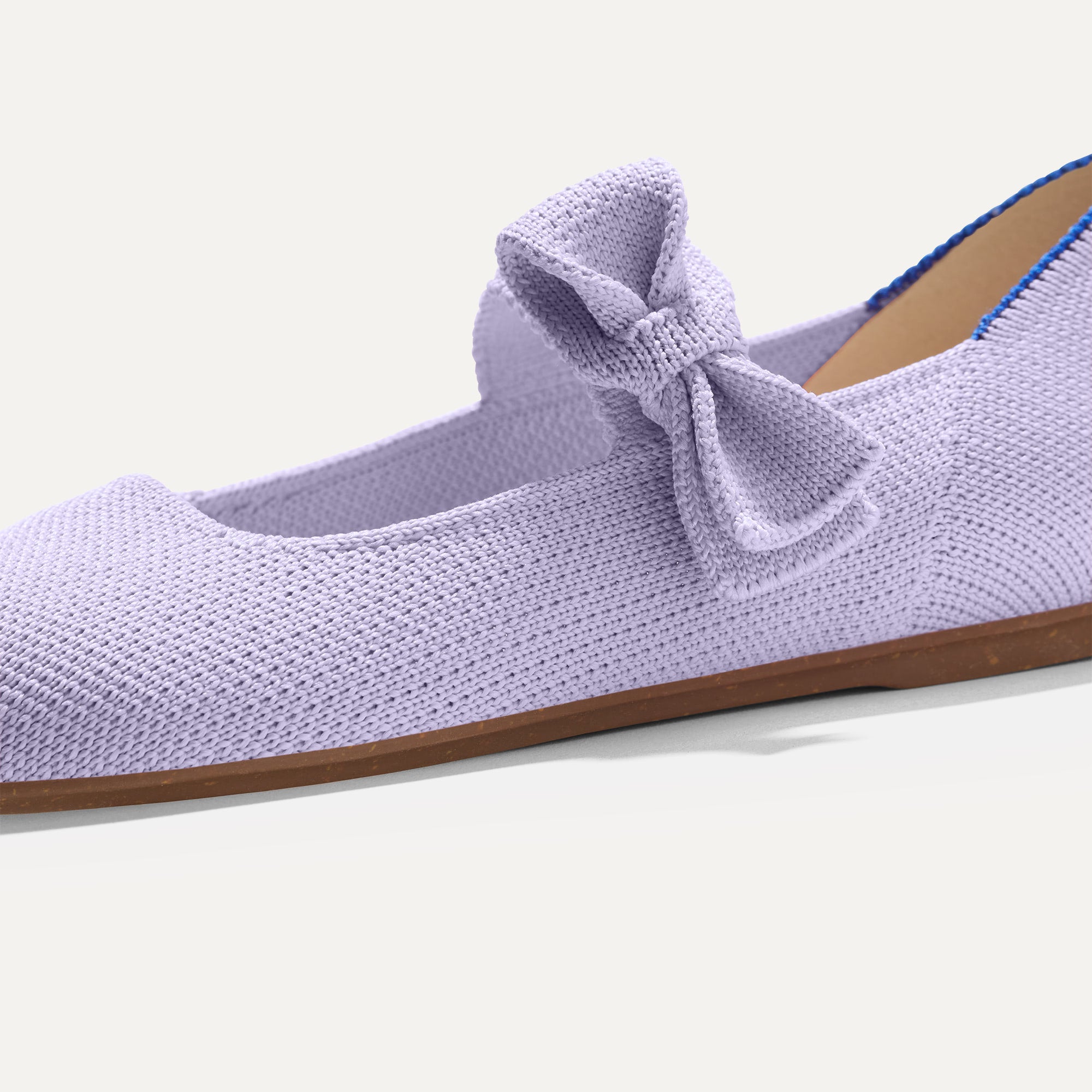 Close up of the bow detail of The Kids Tux Bow Mary Jane in Soft Orchid.
