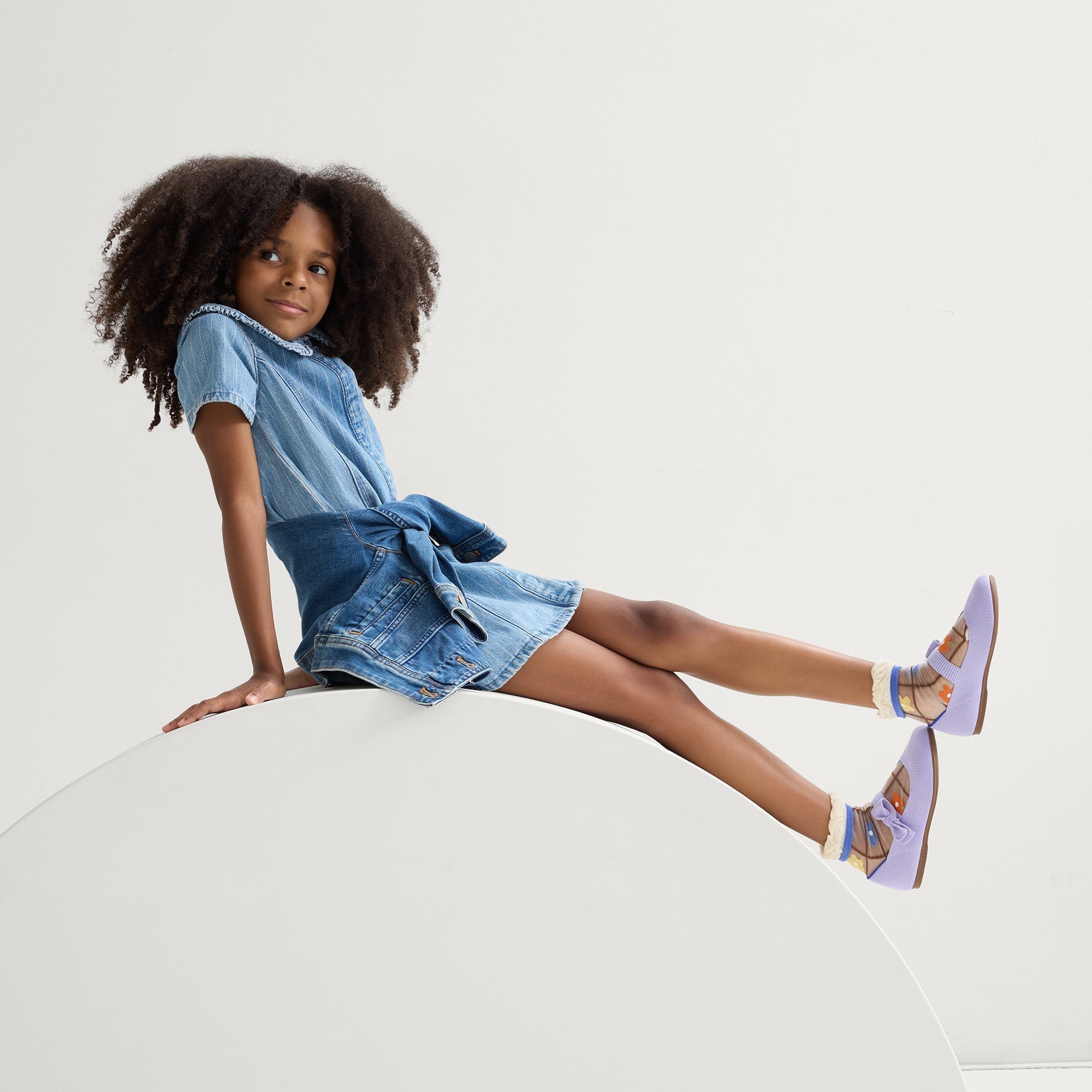 model | Alternate view of a model wearing The Kids Tux Bow Mary Jane in Soft Orchid.