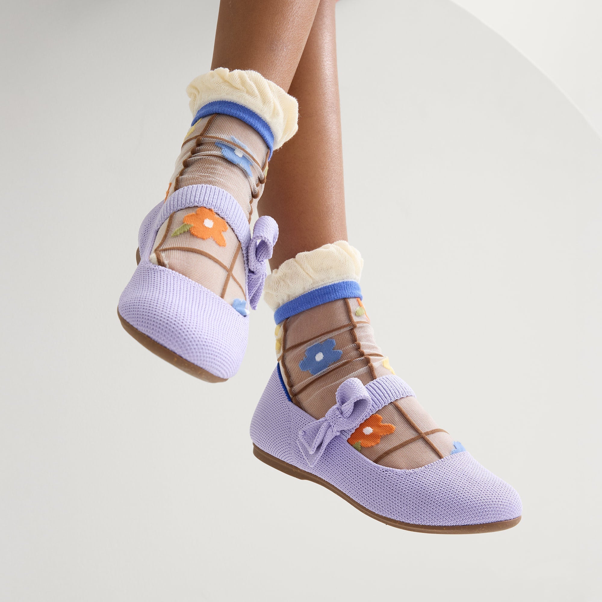hover | Model wearing The Kids Tux Bow Mary Jane in Soft Orchid.