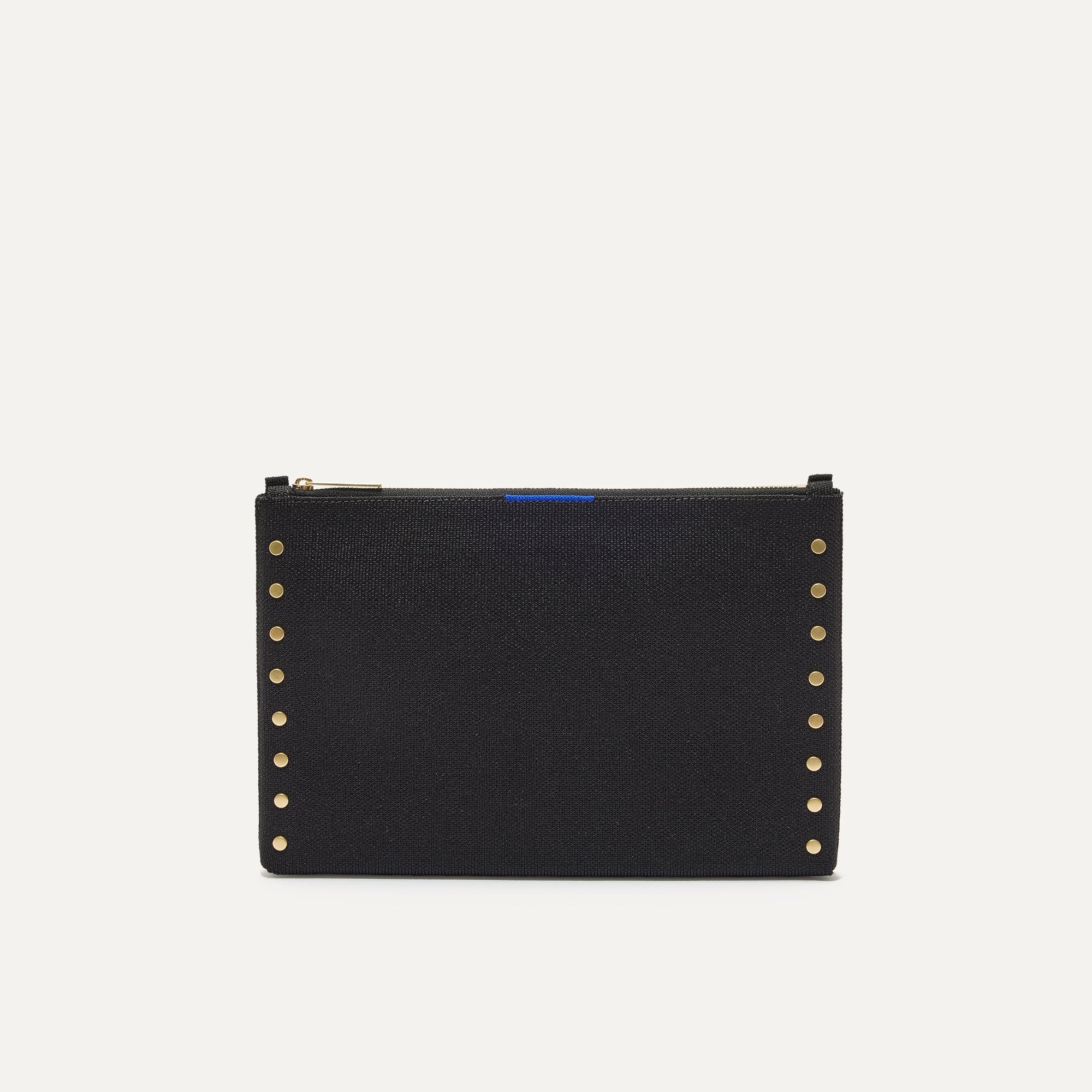 PLP |The Convertible Clutch in Studded Black, shown from the front.