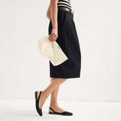 hover |Model shown holding The Travel Pouch Set in Moonflower shown from the front.