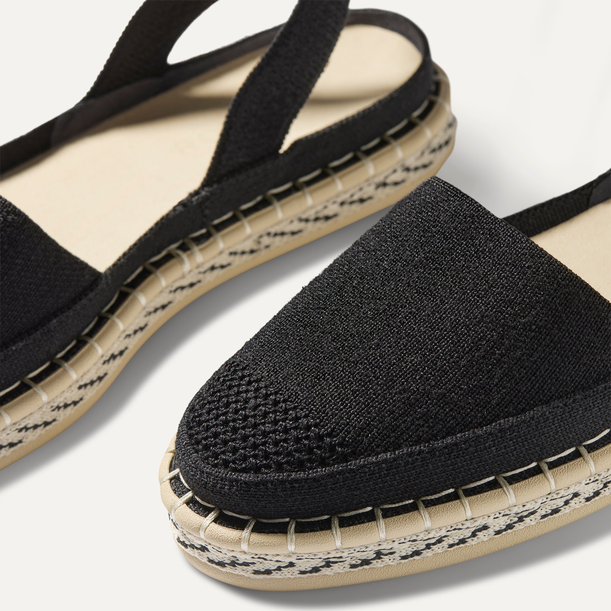Close up of the vamp of The D'Orsay Espadrille in Black. 