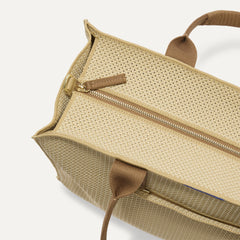 The Classic Tote in Macadamia Open-Knit, shown from above, with the top zipper closed. 
