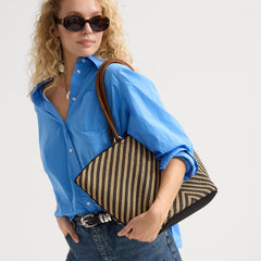 Alternate of Model shown holding The Summer Tote in Toffee Chevron shown from the front.