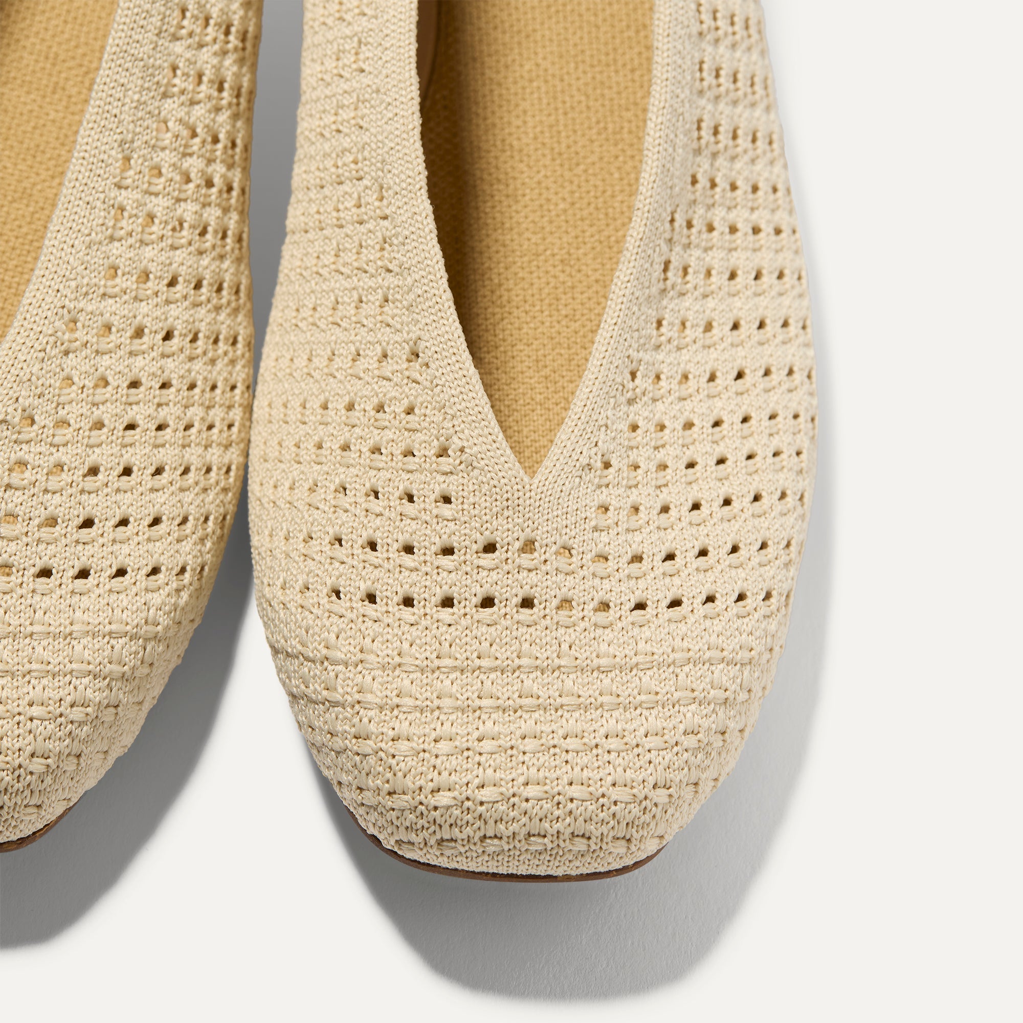 Close up of the toe and V-shaped vamp on The Max Square Ballerina in Off White Mesh.