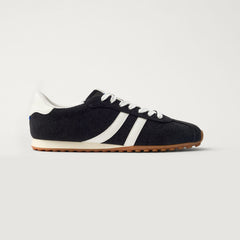 side | The Ivy Sneaker in ReVelvet Black shown from the side.