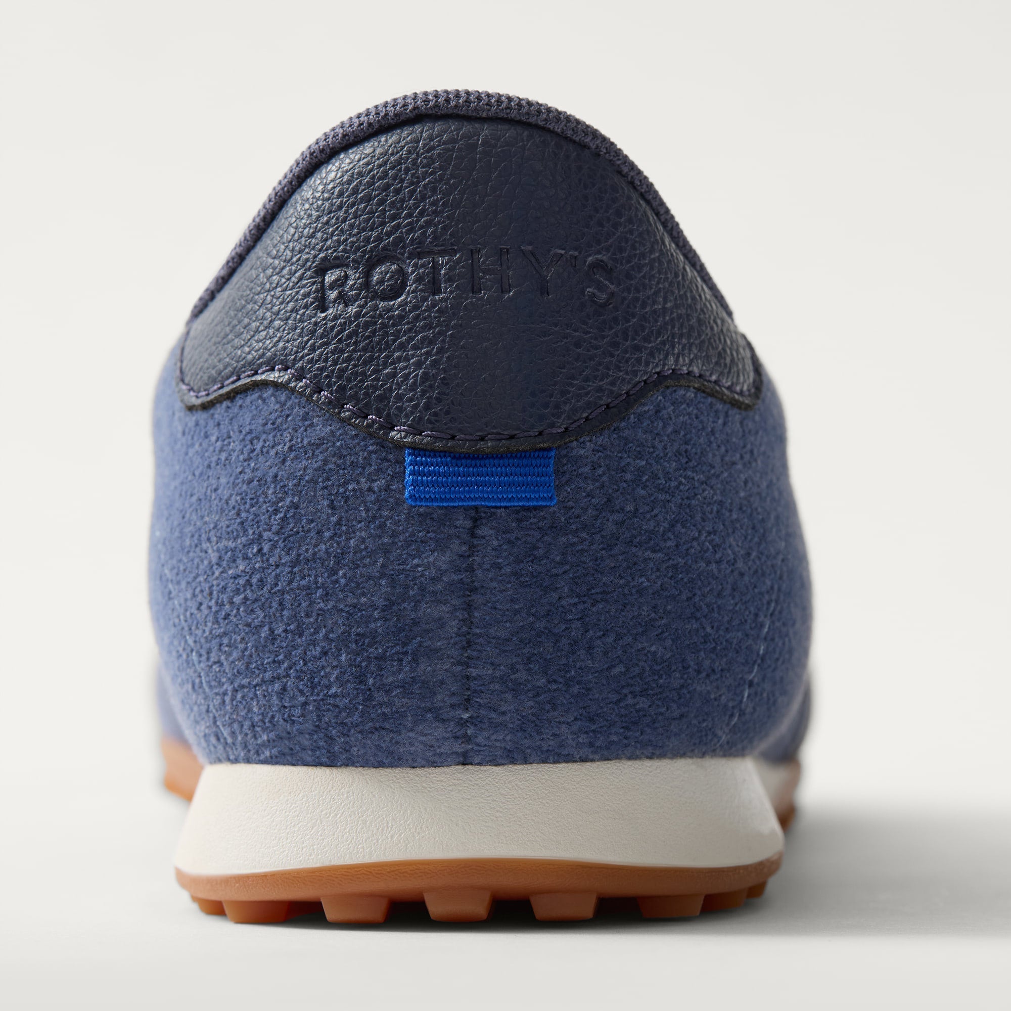 Close up of the heel of The Ivy Sneaker in ReVelvet Overcast.
