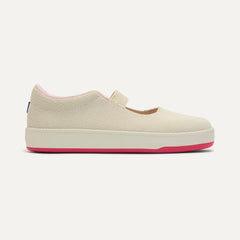 side | The Kids MJ Sneaker in Cream Puff shown from the side.