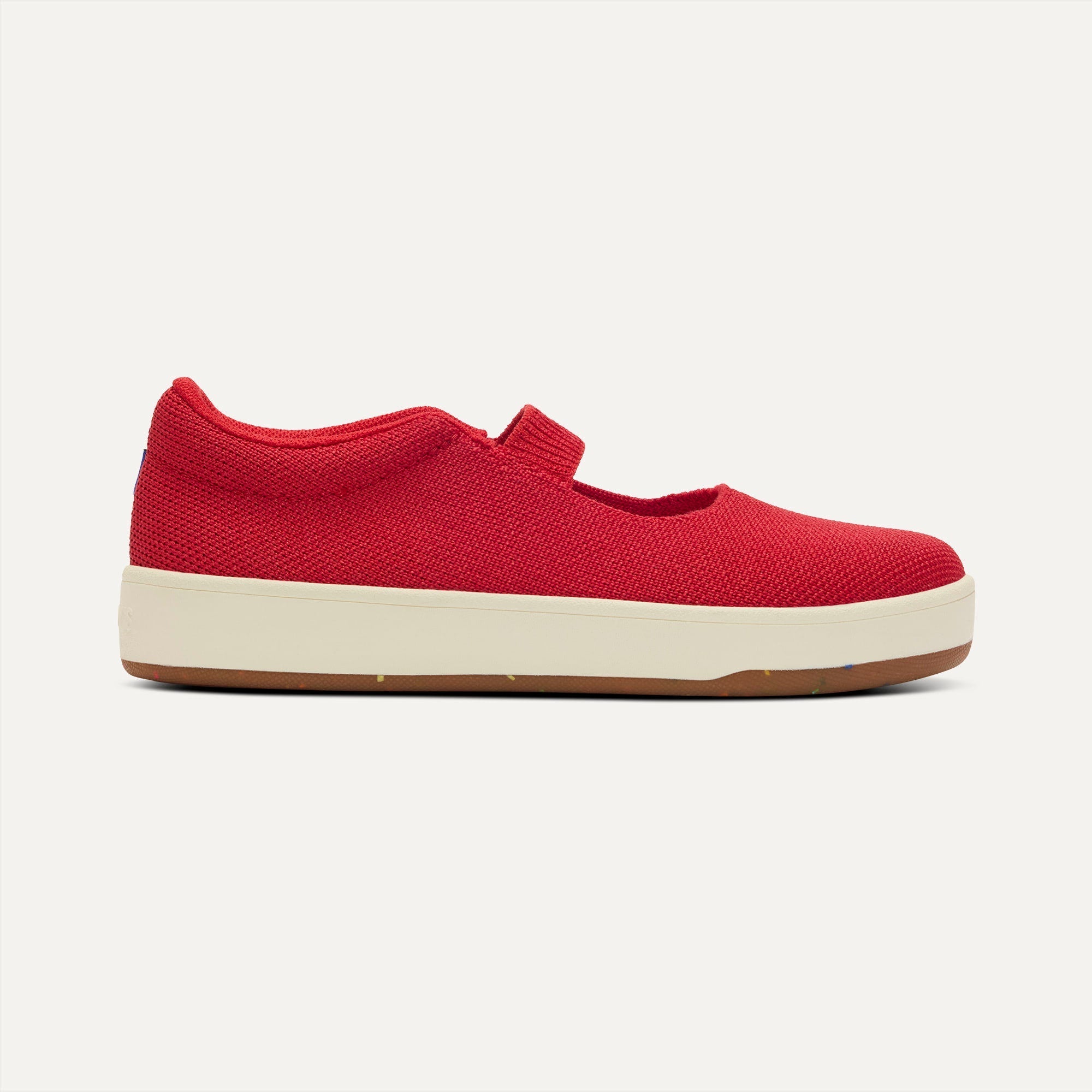side | The Kids MJ Sneaker in Hot Sauce shown from the side.