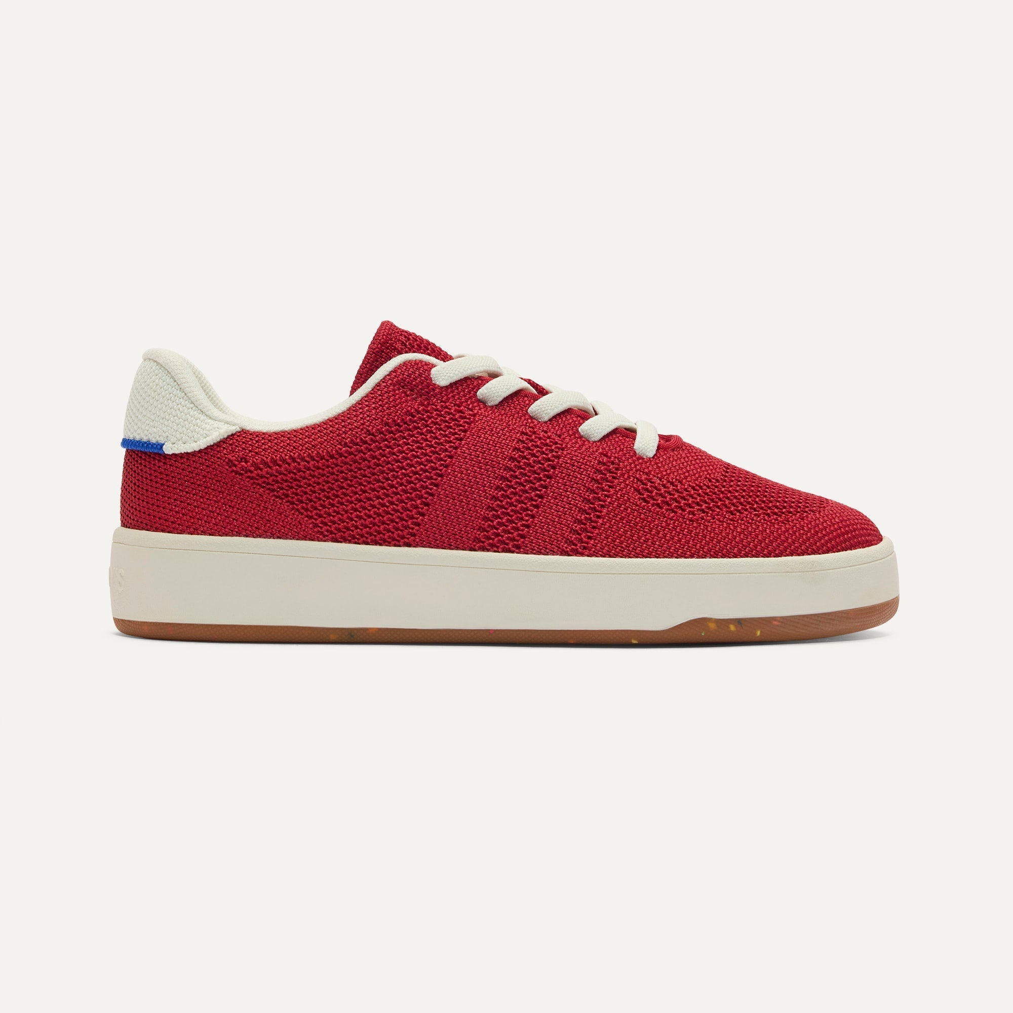 side | The Kids Stretch Sneaker in Firecracker shown from the side. 