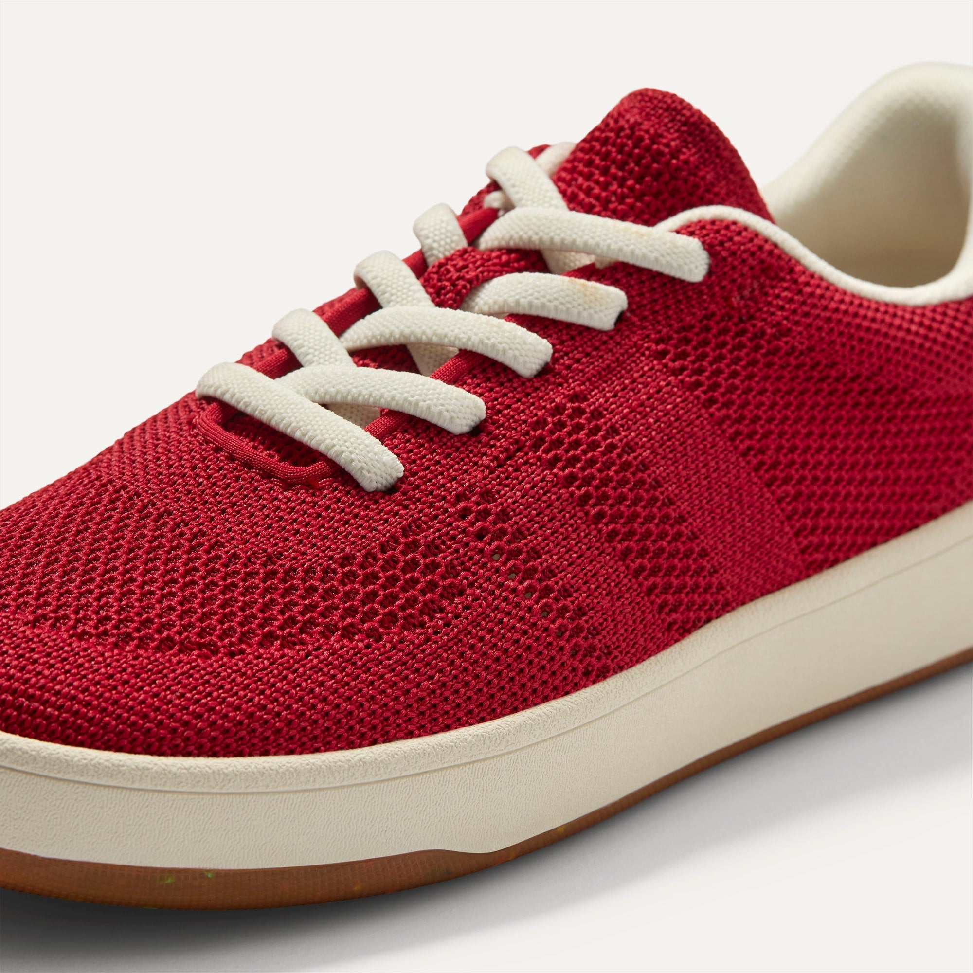 Overlay::Stretchy, No-Tie Laces | Alt:: Close up of the vamp and laces of The Kids Stretch Sneaker in Firecracker.