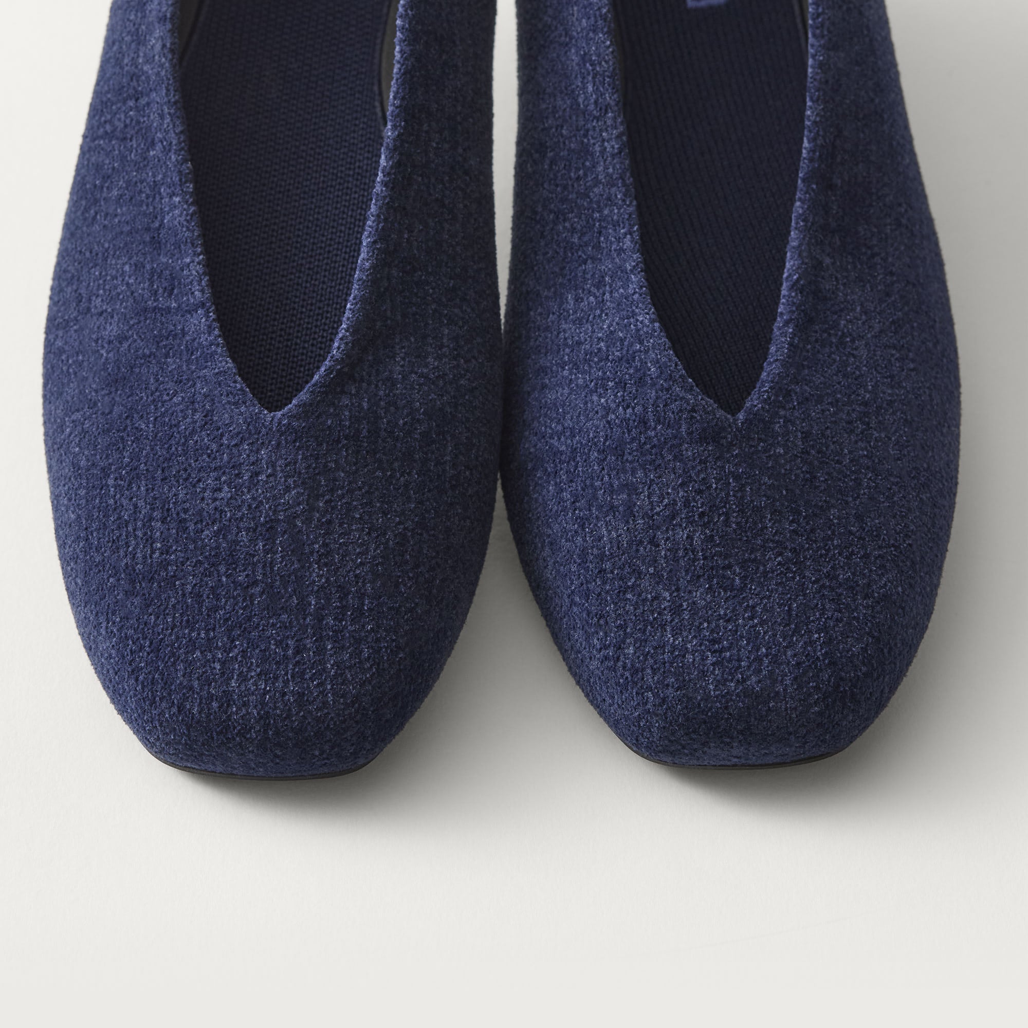 Close up of the toe and V-shaped vamp on The Max Square Ballerina in ReVelvet Navy.