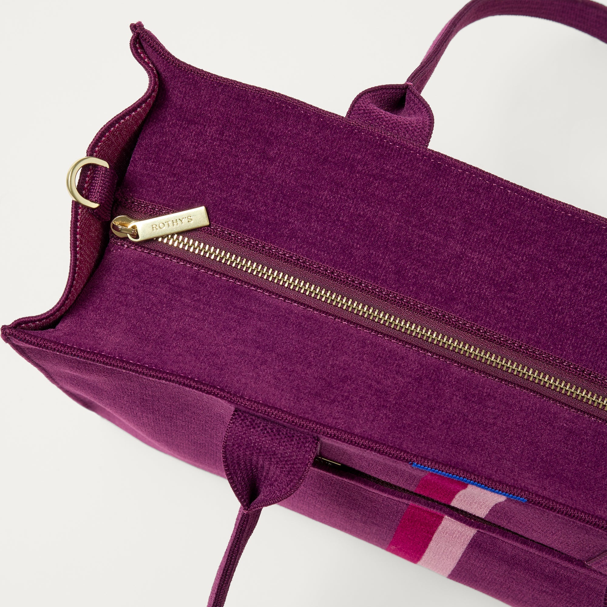 The Classic Tote in ReVelvet Orchid, shown from above, with the top zipper closed. 