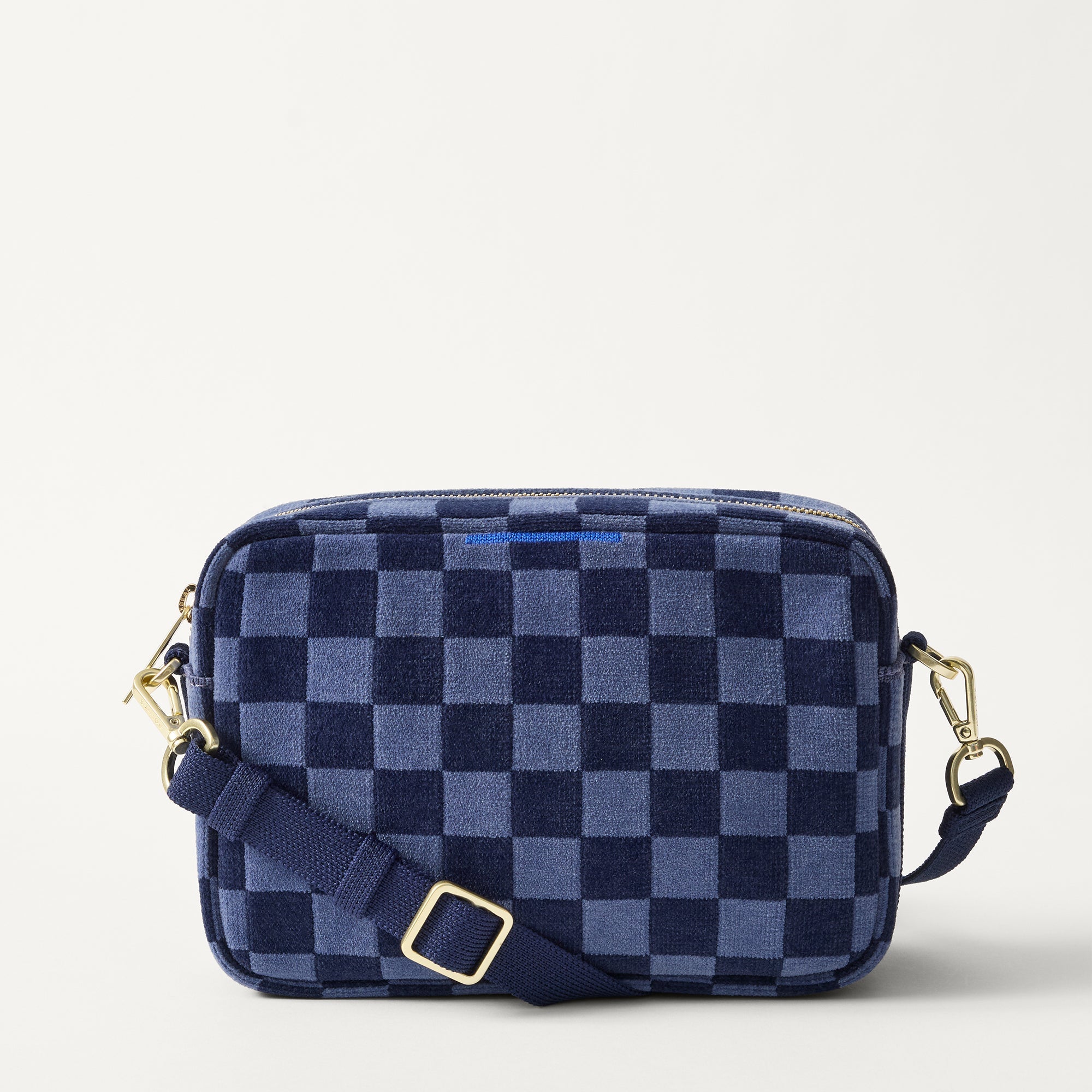 PDP | The Crossbody Camera Bag in  ReVelvet™ Blue Ink, shown from the front. 
