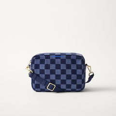 EXT | The Crossbody Camera Bag in  ReVelvet™ Blue Ink, shown from the front. 